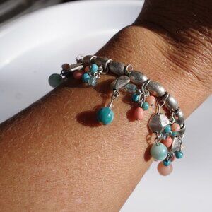 Women`s silver tone bead charm stretch bracelet
